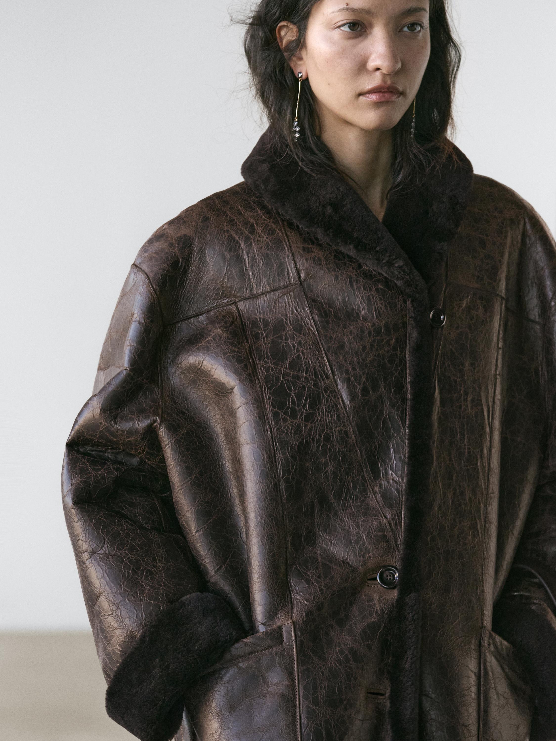 Mouton leather coat with crackled finish